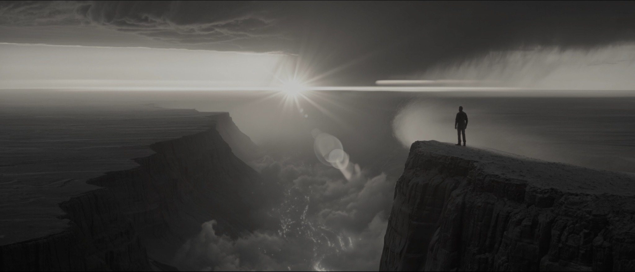 A filmmaker facing a vast cinematic landscape